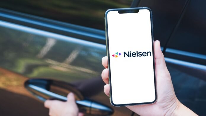 A photo of the Nielsen logo on a mobile phone
